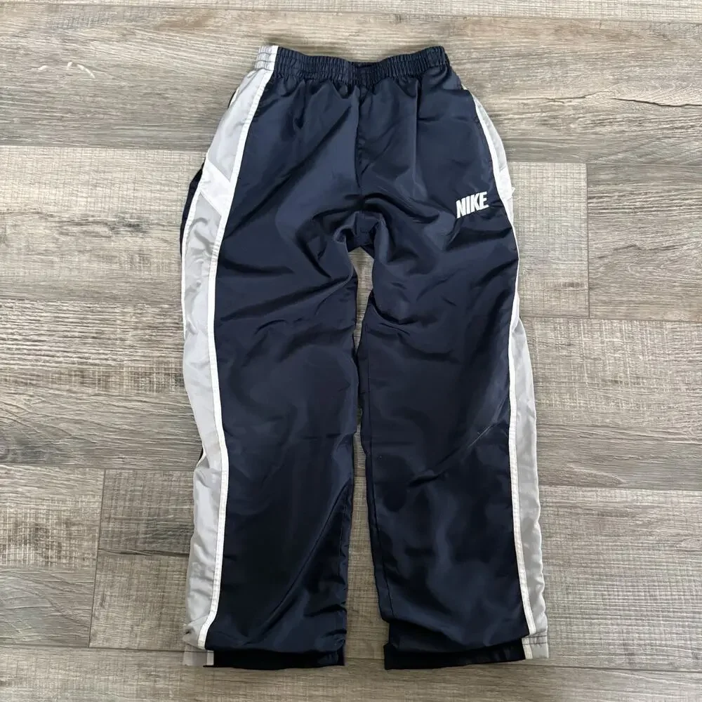 Vtg Y2K Nike Track Pants Logo Size 6 Kids Navy Blue White Baggy Wide Zip Leg